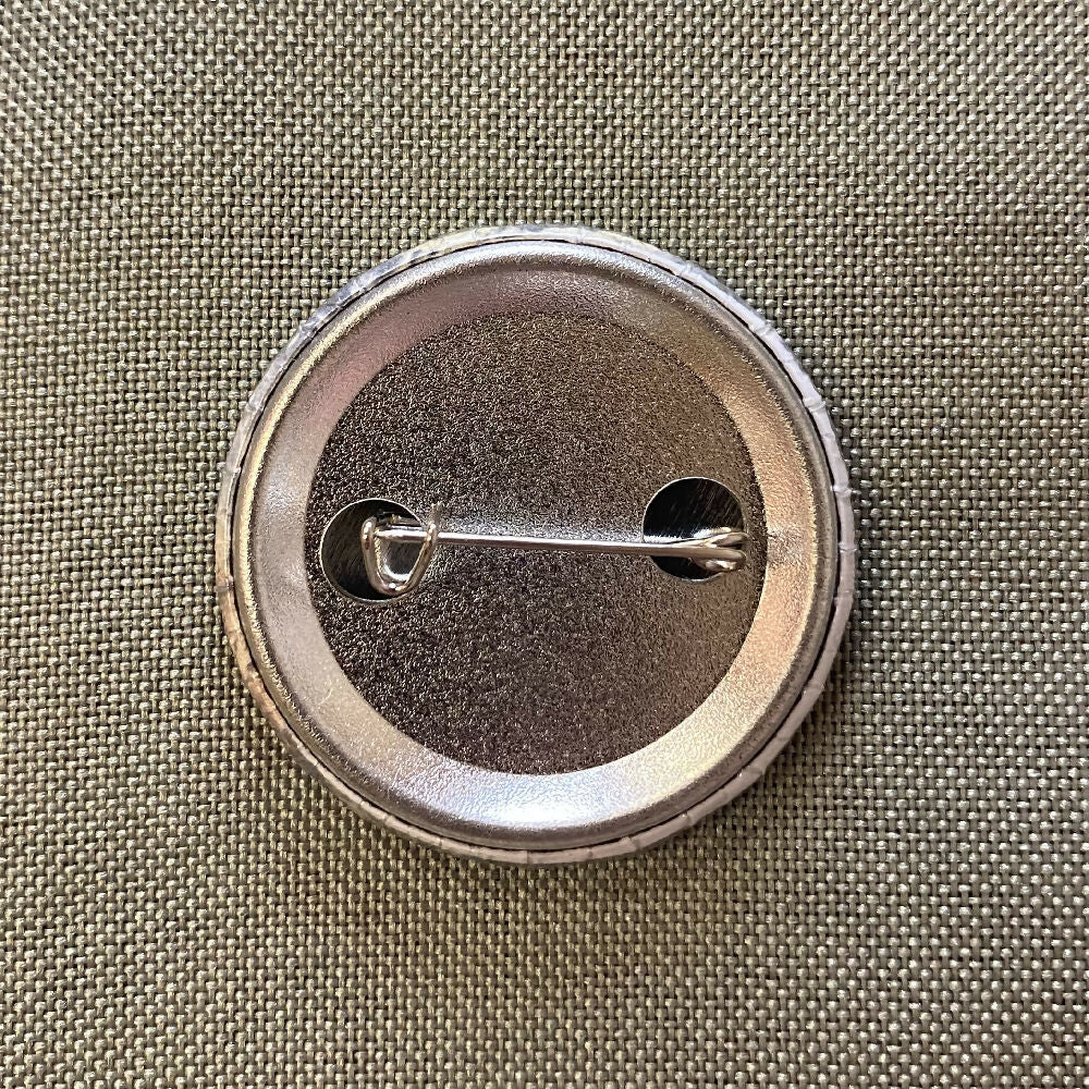 chinga la migra button